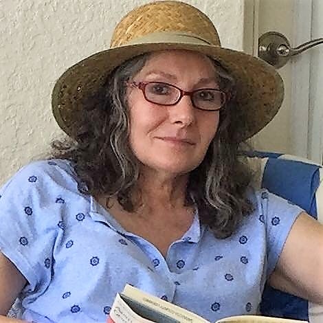 Author in straw hat